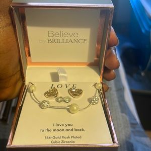 Set of necklace and 2 earrings believe by brilliance